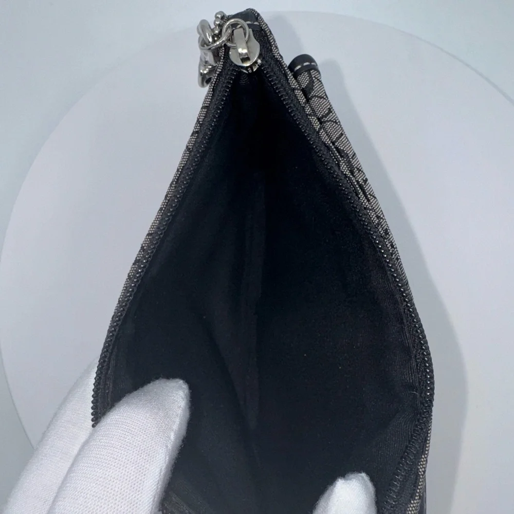 Coach Vintage Soho Black Mini Signature wristlet in EUC